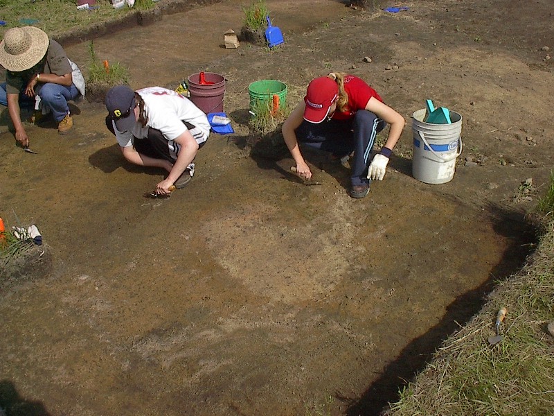 Students troweling a hearth at the Seed-Barker site